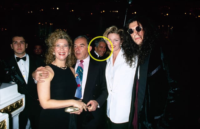 Alison Stern, Robin Leach, Jeffrey Epstein, Cecilia Nord and Howard Stern are seen at Donald Trump’s wedding to Marla Maples in New York in December 1993. Note: CNN has highlighted a portion of this photo to more clearly identify Epstein in the picture.