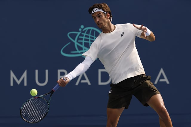 Jul 22, 2025; Washington, D.C., USA; Lorenzo Musetti (ITA) hits a forehand against Cameron Norrie (GBR)(not pictured) in a men's singles match on day two of the Mubadala Citi DC Open at Rock Creek Park Tennis Center. Mandatory Credit: Geoff Burke-Imagn Images