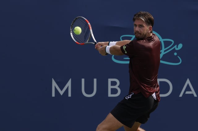 Jul 22, 2025; Washington, D.C., USA; Cameron Norrie (GBR) hits a backhand against Lorenzo Musetti (ITA)(not pictured) in a men's singles match on day two of the Mubadala Citi DC Open at Rock Creek Park Tennis Center. Mandatory Credit: Geoff Burke-Imagn Images