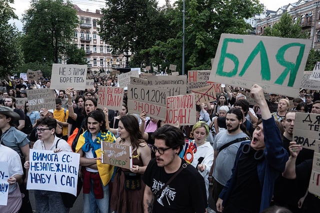 KYIV, UKRAINE - 2025/07/22: Protesters seen with placards, expressing their opinions against a law that strips the National Anti-Corruption Bureau and the Specialised Anti-Corruption Prosecutor's Office of their independence. (Photo by Patryk Jaracz/SOPA Images/LightRocket via Getty Images)
