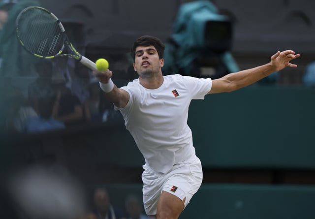 Tennis - Wimbledon - All England Lawn Tennis and Croquet Club, London, Britain - July 13, 2025 Spain's Carlos Alcaraz in action during his men's singles final against Italy's Jannik Sinner REUTERS/Stephanie Lecocq/File Photo