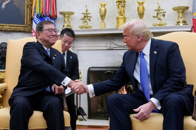 U.S. President Donald Trump shakes hands with Japan's Prime Minister Shigeru Ishiba at the White House in Washington, U.S., February 7, 2025. REUTERS/Kent Nishimura/ File Photo