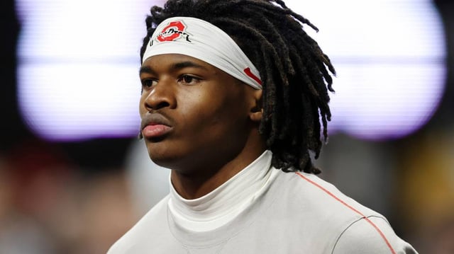 Jan 20, 2025; Atlanta, GA, USA; Ohio State Buckeyes wide receiver Jeremiah Smith (4) warms up before the CFP National Championship college football game at Mercedes-Benz Stadium. Mandatory Credit: Brett Davis-Imagn Images