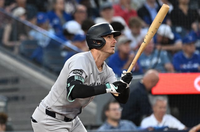 Jul 22, 2025; Toronto, Ontario, CAN;   New York Yankees left fielder Cody Bellinger (35) hits a solo home run against the Toronto Blue Jays in the fifth inning at Rogers Centre. Mandatory Credit: Dan Hamilton-Imagn Images