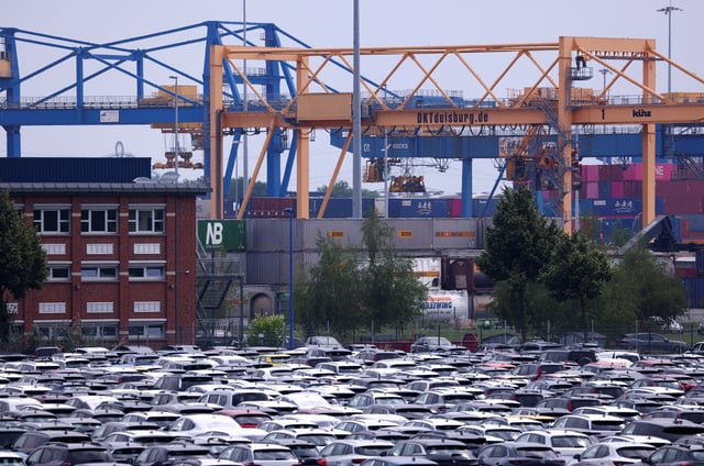 Brand-new cars are stored at a car terminal in the harbour of Duisburg, Germany, July 14, 2025. REUTERS/Thilo Schmuelgen/File Photo