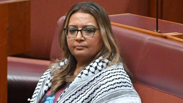 Senate leader Penny Wong accused Mehreen Faruqi of protesting for "attention" after she held a sign calling on the government to sanction Israel. The Greens senator said she would "not back down" from her call.
