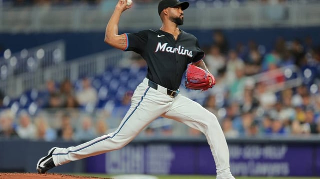 Jul 18, 2025; Miami, Florida, USA; Miami Marlins starting pitcher Sandy Alcantara (22) delivers a pitch against the Kansas City Royals during the first inning at loanDepot Park. Mandatory Credit: Sam Navarro-Imagn Images