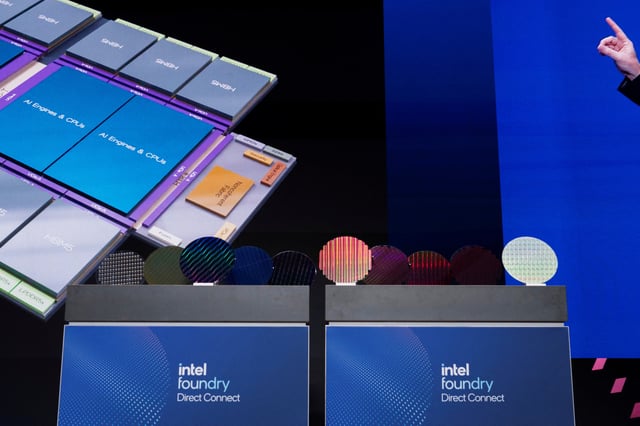Intel wafers are displayed on stage at the company's Annual Manufacturing Technology Conference in San Jose, California, U.S. April 29, 2025.  REUTERS/Laure Andrillon/FIle photo