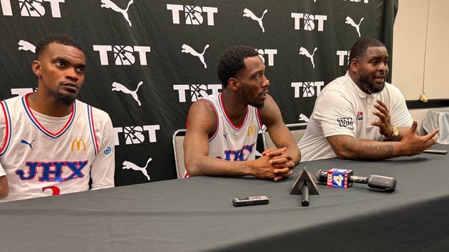 Lagerald Vick, left, Tyshawn Taylor, middle, and Sherron Collins of JHX Hoops meet with media after a Round of 32 victory over K-State’s Purple Reign team in the $1 million winner-take-all TBT on Monday, July 21, 2025.