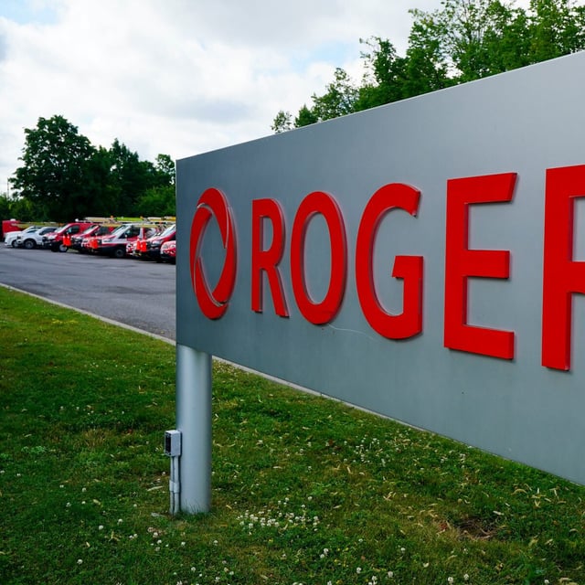 Rogers Communications signage is pictured in Ottawa on Tuesday, July 12, 2022. Rogers Communications Inc. has launched a new satellite-to-mobile text messaging service, marking the latest step in its partnership with SpaceX and Lynk Global to eventually deliver full satellite-to-phone coverage across apps, data and voice service. THE CANADIAN PRESS/Sean Kilpatrick