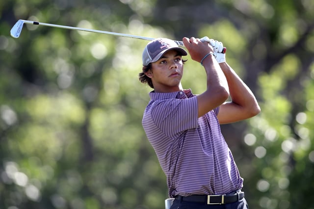 Charlie Woods hits a tee shot on the fourth hole during the first round of the U.S. Junior Amateur at Brook Hollow Golf Club on July 21, 2025 in Dallas, Texas.