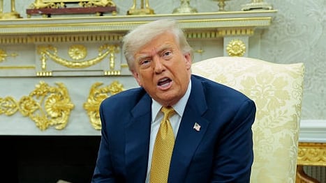 WASHINGTON, DC - JULY 16: Crown Prince of Bahrain Salman bin Hamad Al Khalifa (L) listens as U.S. President Donald Trump speaks to reporters during a meeting in the Oval Office of the White House on July 16, 2025, in Washington, D.C. Trump is scheduled to hold a bilateral meeting and working lunch with the Crown Prince during the visit. (Photo by Anna Moneymaker/Getty Images)