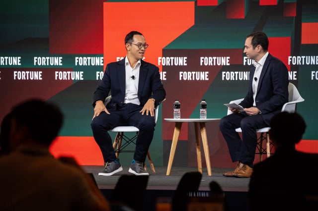 Oliver Jay (left), OpenAI&#39;s  Managing Director for International markets, speaking at Fortune Brainstorm AI in Singapore on July 23, 2025.