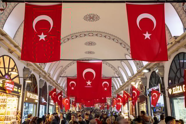People stroll through the historic Grand Bazaar, a popular tourist attraction and one of the country's most important economic venues, in Istanbul, Turkey, October 22, 2024. REUTERS/Murad Sezer/File Photo