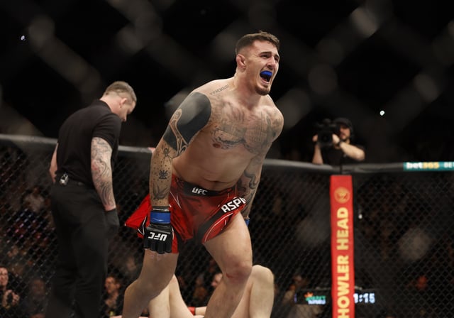 Mixed Martial Arts - UFC - Alexander Volkov v Tom Aspinall - O2 Arena, London, Britain - March 19, 2022 Tom Aspinall celebrates winning his fight against Alexander Volkov Action Images via Reuters/Peter Cziborra/File Photo