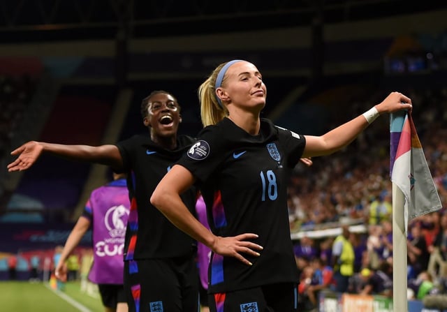 Chloe Kelly celebrates scoring England&#39;s second goal from a rebound following a saved penalty in extra-time.
(Photo by Harriet Lander - The FA/The FA via Getty Images)