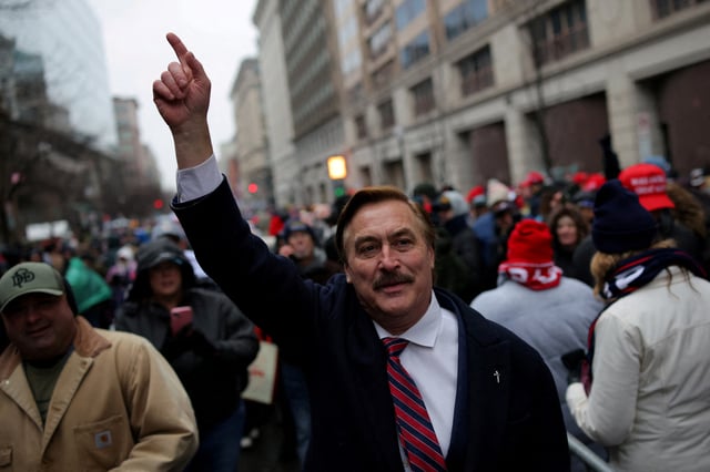 My Pillow CEO Mike Lindell gestures as supporters of U.S. President-elect Donald Trump gather outside Capital One Arena, for a rally a day before he is scheduled to be inaugurated for a second term, in Washington, U.S., January 19, 2025. REUTERS/Daniel Cole/File Photo