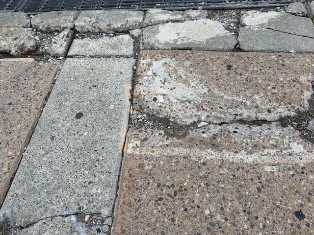  Damaged sections of 4 Street S.W. sidewalk on July 23, 2025 in Calgary, Alberta that were marked for repair months go but never fixed. Photo by Don Braid