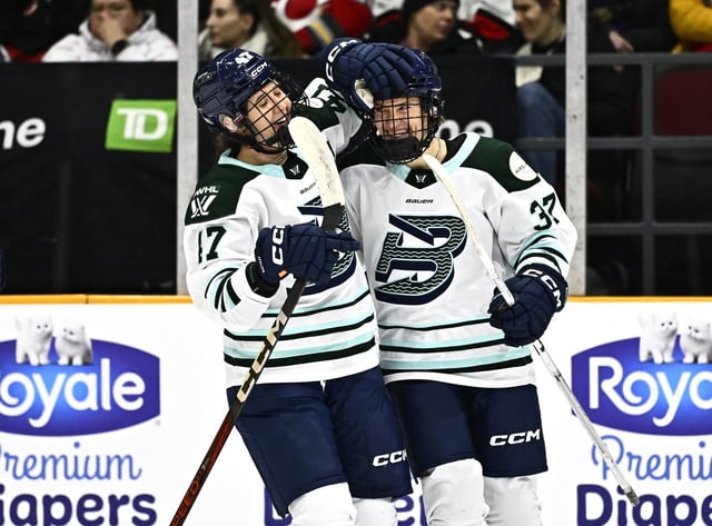 Boston Fleet's Theresa Schafzahl (37) celebrates after her goal against the Ottawa Charge with Jamie Lee Rattray (47) during first-period PWHL hockey game action in Ottawa, Ontario, Thursday, Feb. 20, 2025. (Justin Tang/The Canadian Press via AP, File)