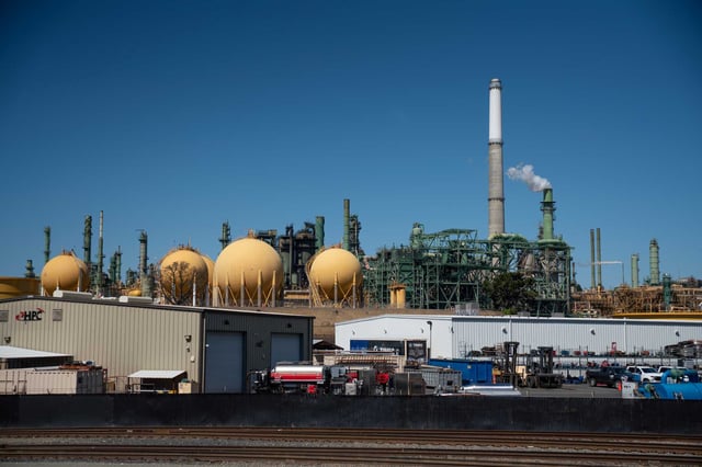 Smoke billows from stacks after a morning fire at the Valero refinery in Benicia on Monday, May 5, 2025. As gas prices soar across the state, California officials are intervening to find a buyer, according to a new report.
