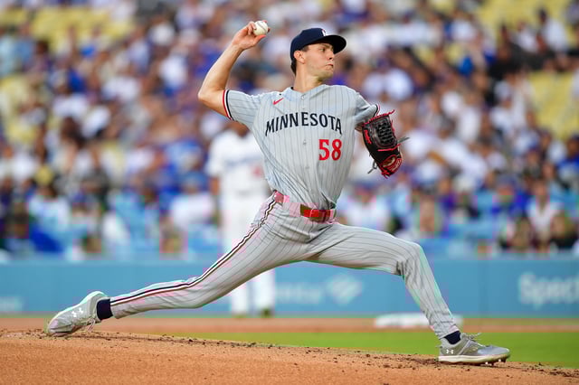 Jul 21, 2025; Los Angeles, California, USA; Minnesota Twins pitcher David Festa (58) throws against the Los Angeles Dodgers during the first inning at Dodger Stadium. Mandatory Credit: Gary A. Vasquez-Imagn Images
