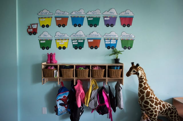 Children's backpacks and shoes are seen at a daycare in Langley, B.C., on Tuesday, May 29, 2018. THE CANADIAN PRESS/Darryl Dyck