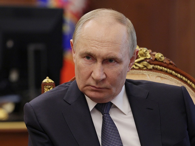 In this pool photograph distributed by the Russian state agency Sputnik, Russia's President Vladimir Putin meets with Belgorod Region Governor in Moscow on July 11, 2025. (Photo by Mikhail METZEL / POOL / AFP) (Photo by MIKHAIL METZEL/POOL/AFP via Getty Images)
