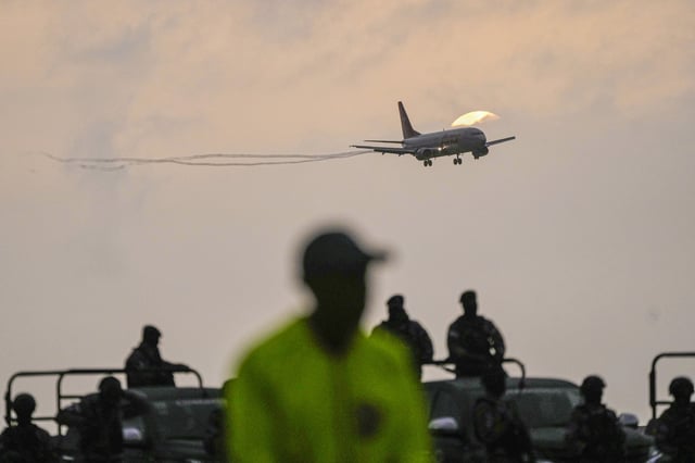 A plane carrying migrants deported months ago by the United States to El Salvador under the Trump administration's immigration crackdown lands at Simón Bolívar International Airport in Maiquetía, Venezuela,on July 18, 2025.