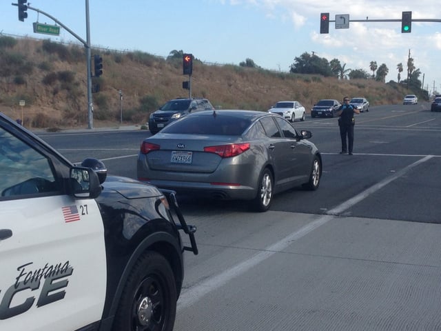Fontana police photograph a car stolen with an infant inside it at a Fontana restaurant, then located at River Road and Bluff Street in Norco in 2017. (Photo by Brian Rokos, The Press-Enterprise/SCNG)