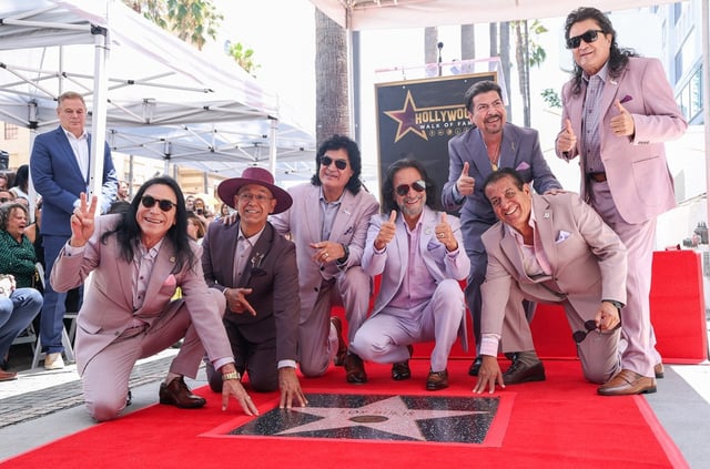 "Los Bukis" (L-R) Jose Javier Solis, Eusebio "Chivo" Cortez, Roberto Guadarrama, Marco Antonio Solis, Joel Solis, Pedro Sanchez and Jose "Pepe" Guadarrama and Gabriel "Fluffy" Iglesias during their Hollywood Walk of Fame star ceremony on July 23, 2025.
