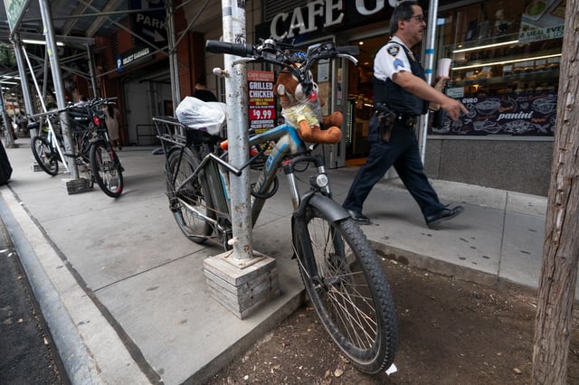 An abandoned bike sits chained to scaffolding across from the Jacob K. Javits Federal Building Wednesday, July 23, 2025 in Manhattan, New York. (Barry Williams / New York Daily News)