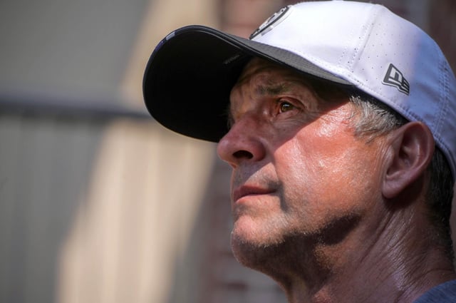 Baltimore Ravens head football coach John Harbaugh speaks to the press during the first day on training camp. (Karl Merton Ferron/Staff)
