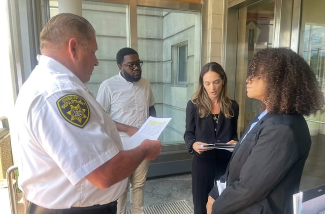 Jail officials speak with State Sen. Julia Salazar before allowing her access to a Nassau County East Meadow jail facility on Juky 23, 2024. ( X/NYS Senator Julia Salazar)