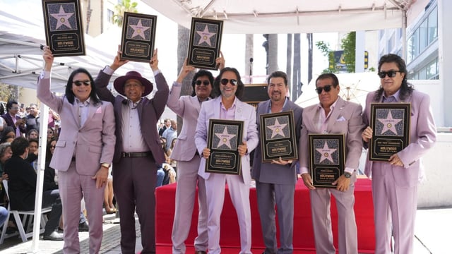 Jose Javier Solis, from left, Eusebio “Chivo” Cortez, Roberto Guadarrama, Marco Antonio Solis, Joel Solis, Pedro Sanchez, and Jose “Pepe” Guadarrama of Los Bukis attend a ceremony honoring the group with a star on the Hollywood Walk of Fame on Wednesday, July 23, 2025, in Los Angeles. (Photo by Jordan Strauss/Invision/AP)