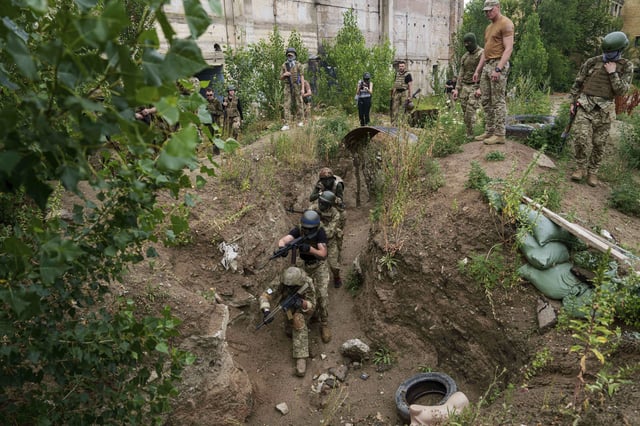 Ukrainian 3rd Assault Brigade recruits train at the polygon in Kyiv region, Ukraine, on Wednesday, July 16, 2025. (AP Photo/Evgeniy Maloletka)