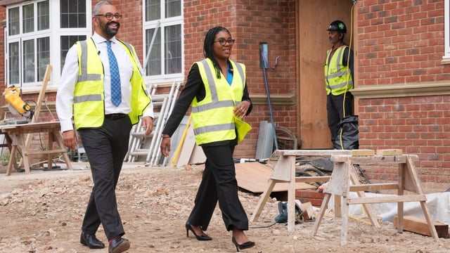 Kemi Badenoch with her new shadow housing secretary, Sir James Cleverly, on a visit to a housing development in Northwood, Middlesex, on Wednesday