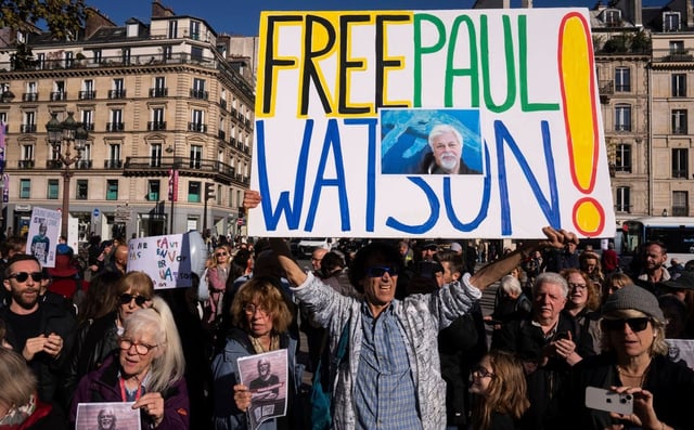 People demonstrate in Paris last October to support Paul Watson, who was asking France’s president for political asylum. Photo: AP