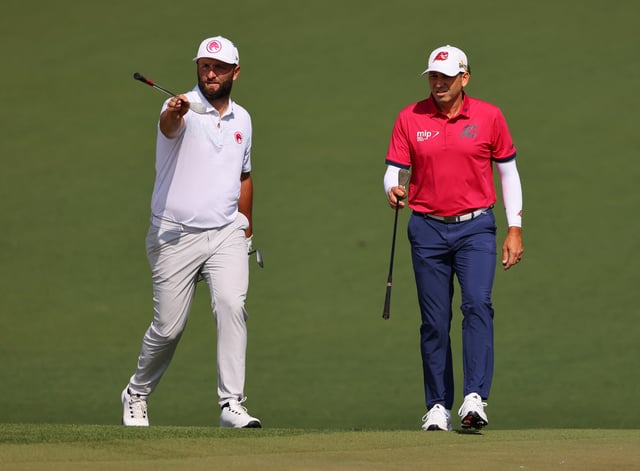 Golf - The Masters - Augusta National Golf Club, Augusta, Georgia, U.S. - April 10, 2024 Spain's Sergio Garcia and Spain's Jon Rahm on the 2nd hole during a practice round REUTERS/Mike Blake/File Photo