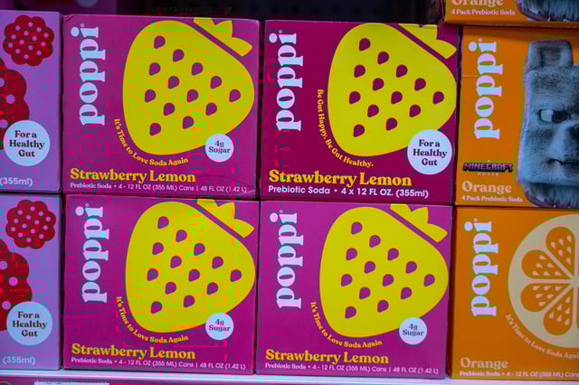Cans of Poppi soda are displayed in a store on March 17, 2025 in New York City.