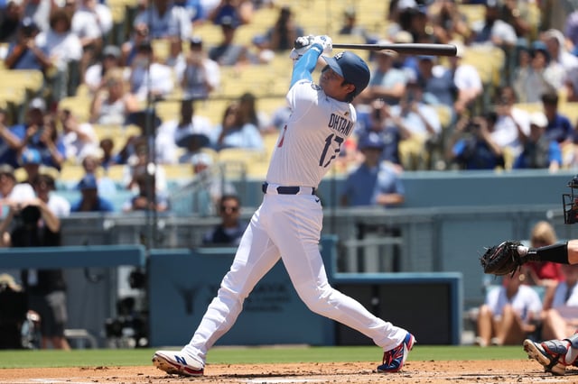 Jul 23, 2025; Los Angeles, California, USA; Los Angeles Dodgers designated hitter Shohei Ohtani (17) hits a home run during the first inning against the Minnesota Twins at Dodger Stadium. Mandatory Credit: Kiyoshi Mio-Imagn Images