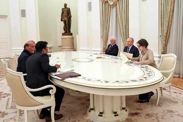Officials, including Russia's President Vladimir Putin, Defence Minister Andrei Belousov and India's Defence Minister Rajnath Singh, attend a meeting in Moscow, Russia December 10, 2024. Sputnik/Sofya Sandurskaya/Pool via REUTERS/File Photo