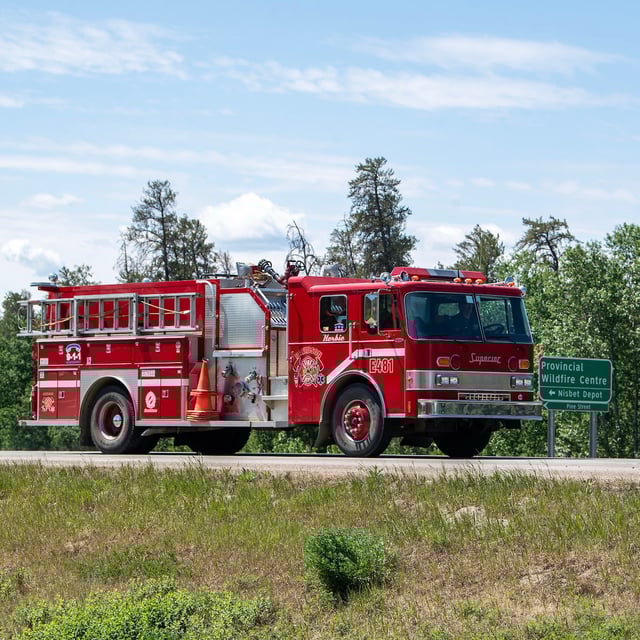 Volunteer firefighters from Davidson, Sask., load up their truck at the Provincial Wildfire Center in Prince Albert, Sask., Wednesday, June 4, 2025. THE CANADIAN PRESS/Liam Richards<