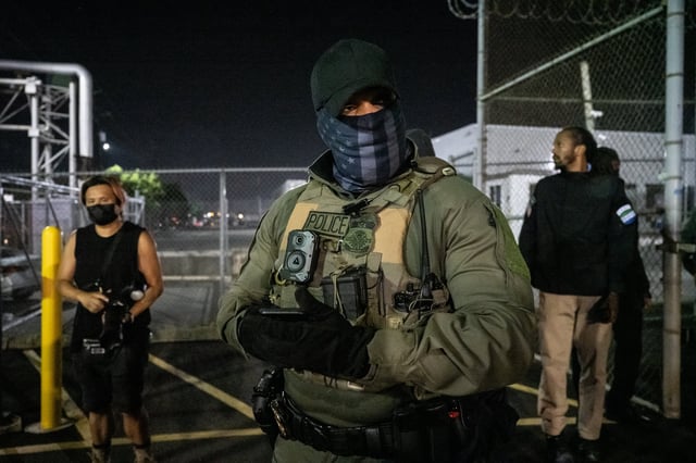 NEWARK, NEW JERSEY - JUNE 12: U.S. Immigration and Customs Enforcement (ICE) agents guard outside Delaney Hall, a migrant detention facility, while anti-ICE activists demonstrate on June 12, 2025 in Newark, New Jersey. Anti-ICE protests have been spreading to cities across America since Ice deportation quotas have increased. (Photo by Stephanie Keith/Getty Images)