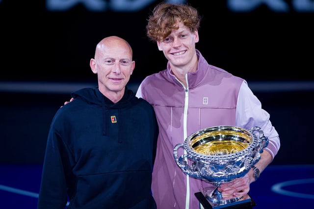 Jannik Sinner (right) celebrates his Australian Open victory in 2024 with Umberto Ferrara (left).