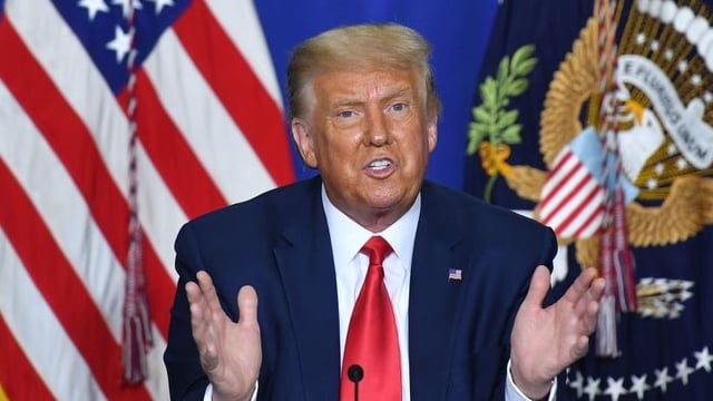 US President Donald Trump speaks to officials during a roundtable discussion on community safety, at Mary D. Bradford High School in in Kenosha, Wisconsin on September 1, 2020. - Trump visited Kenosha, the city at the center of a raging US debate over racism, despite pleas to stay away and claims he is dangerously fanning tensions as a reelection ploy. (Photo by MANDEL NGAN / AFP) (Photo by MANDEL NGAN/AFP via Getty Images)