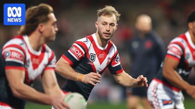 Sam Walker of the Roosters runs drills
