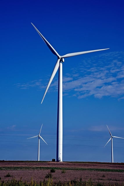 Wind turbines at the Spearville Wind Farm, on Sept. 23, 2014, in Spearville, Kansas. Under the Grain Belt Express project, high-voltage transmission lines would carry Kansas wind power across Missouri to power grids in the East. The U.S. Department of Energy has canceled a conditional $4.9 billion loan for the 800- mile Grain Belt Express transmission line. (Mark Reinstein/Zuma Press/TNS)