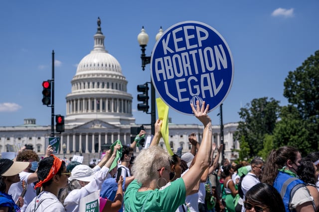 FILE - Abortion-rights activists demonstrate against the Supreme Court decision to overturn Roe v. Wade that established a constitutional right to abortion, on Capitol Hill in Washington, June 30, 2022. (AP Photo/J. Scott Applewhite, File)