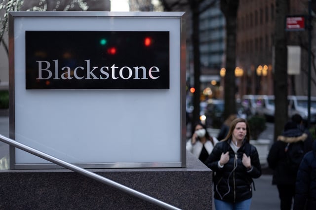 Signage is seen outside the Blackstone Group headquarters in New York City, U.S., January 18, 2023. REUTERS/Jeenah Moon/File photo