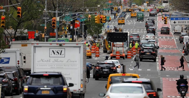 Traffic travels on First Avenue in Manhattan, New York City, New York, U.S., April 22, 2021. REUTERS/Andrew Kelly